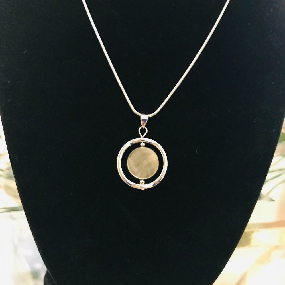 LIA SOPHIA SILVERTONE CIRCLE PENDANT WITH GOLDTONE INNER CIRCLE CHAIN NECKLACE